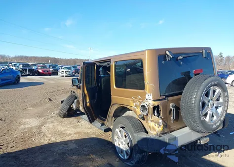 2011 Jeep Wrangler Unlimited 70Th Anniversary z USA, uszkodzony, nr VIN 1J4BA7H11BL581712